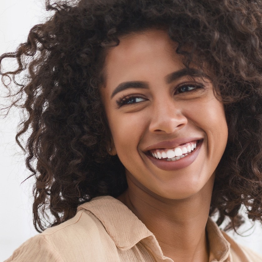 Black girl with white smile, copy space